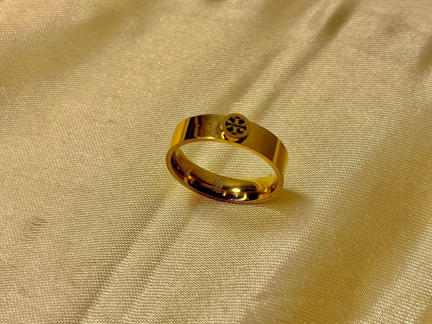 Minimalist Gold-Tone Band Ring with Emblem