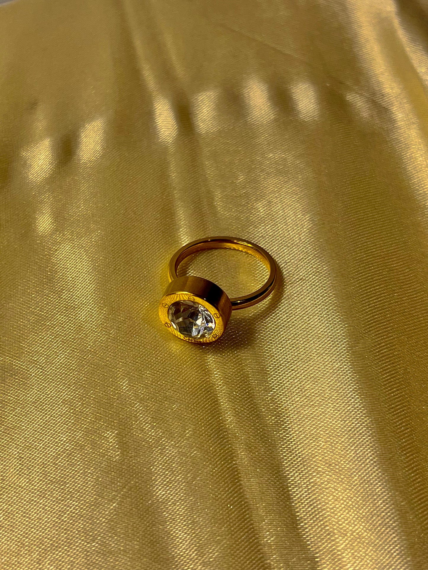Gold-Tone Crystal Solitaire Ring with Roman Numeral Detail